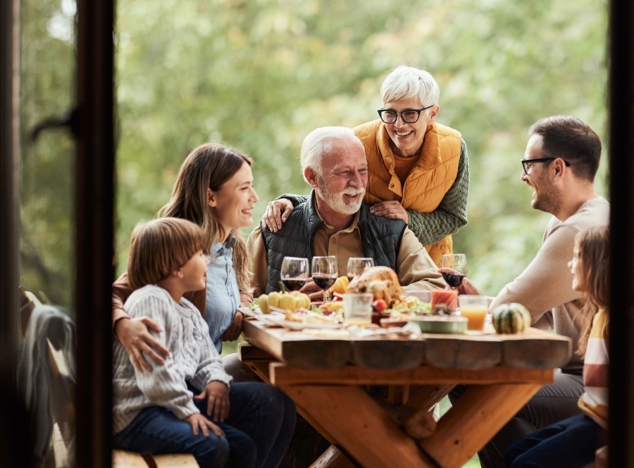 Multigenerational family gathered around dinner table